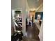 Hallway view of home entrance and sight lines to dining and living areas at 124 Gorham Gates Ct, Hiram, GA 30141