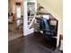 Cozy under-staircase home office nook with desk, chair, and charming decor, a great use of space at 124 Gorham Gates Ct, Hiram, GA 30141
