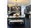 Stylish kitchen with granite countertops, stainless steel appliances, and a modern dining area at 124 Gorham Gates Ct, Hiram, GA 30141