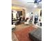 Open-concept living room and kitchen, featuring a chalkboard wall, neutral furnishings, and modern decor at 124 Gorham Gates Ct, Hiram, GA 30141