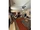 Inviting living room with an open floor plan, fireplace, and seamless flow to the kitchen and dining areas at 124 Gorham Gates Ct, Hiram, GA 30141