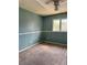 Neutral bedroom with a two-toned wall and natural lighting at 1807 Ashborough Se Cir # B, Marietta, GA 30067