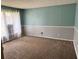 Carpeted living room with two-toned walls at 1807 Ashborough Se Cir # B, Marietta, GA 30067