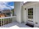 Wooden deck with trees in the backyard with a view of the exterior of the home at 5414 Sweetsprings Sw Dr, Powder Springs, GA 30127