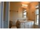 Bathroom with natural light, white vanity with a marble countertop and neutral walls at 920 Society Sw Cir, Atlanta, GA 30331