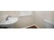 Powder room with pedestal sink and tile flooring at 920 Society Sw Cir, Atlanta, GA 30331