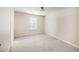 Bedroom with neutral colored walls and carpeted floor at 920 Society Sw Cir, Atlanta, GA 30331