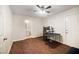 Versatile bedroom with a ceiling fan, wood floors, and natural light, ready for personalization at 920 Society Sw Cir, Atlanta, GA 30331