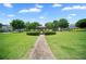 Community gazebo in a green space, surrounded by trees and landscaping, promotes relaxation at 920 Society Sw Cir, Atlanta, GA 30331