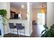 Open kitchen with breakfast bar, modern appliances and a view into the living room at 920 Society Sw Cir, Atlanta, GA 30331