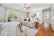 Bright and airy living room with hardwood floors, large windows, and comfortable seating at 1580 Lower Burris Rd, Canton, GA 30114
