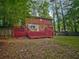 Backyard featuring a large wooden deck and fenced-in yard at 5642 Dorsett Shoals Rd, Douglasville, GA 30135