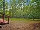 Spacious fenced in backyard and wooden deck at 5642 Dorsett Shoals Rd, Douglasville, GA 30135