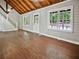 Open living room area with hardwood floors and staircase at 5642 Dorsett Shoals Rd, Douglasville, GA 30135
