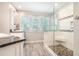 This newly renovated bathroom has new tiling in the shower and on the floor, as well as a window for natural lighting at 1655 Peachcrest Dr, Lawrenceville, GA 30043