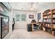 This home office has hardwood shelving for plenty of storage and a window for natural light while you work at 1655 Peachcrest Dr, Lawrenceville, GA 30043