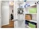 Walk-in pantry with shelving for optimal storage and organization at 1655 Peachcrest Dr, Lawrenceville, GA 30043