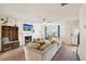 Bright living room featuring a fireplace, a large window, and a neutral color scheme for a serene atmosphere at 5686 Grindstone Dr, Buford, GA 30518