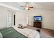 Serene main bedroom with vaulted ceilings, a ceiling fan, and a relaxing atmosphere for restful nights at 5686 Grindstone Dr, Buford, GA 30518