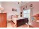 Cozy bedroom with neutral-colored walls and decor at 805 Cog Hl, Mcdonough, GA 30253