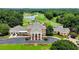 Upscale brick clubhouse overlooking a golf course and pond at 805 Cog Hl, Mcdonough, GA 30253