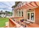 Outdoor deck with ample seating and a retractable awning, great for entertaining at 805 Cog Hl, Mcdonough, GA 30253