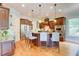 Gourmet kitchen with stainless steel appliances, a center island, and stylish pendant lighting at 805 Cog Hl, Mcdonough, GA 30253