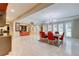 Open floor plan with elegant dining area, tile floors, and large windows provide ample natural light at 805 Cog Hl, Mcdonough, GA 30253