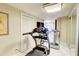 This workout room has a treadmill, bike, and mirrored wall for home fitness and exercise at 805 Cog Hl, Mcdonough, GA 30253