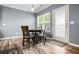 Dining area with natural light, table, chairs, and access to the backyard at 132 Berkleigh Trails Dr, Hiram, GA 30141