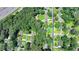 Aerial view showcasing the neighborhood with mature trees and well-maintained lawns at 1970 Fisher Ne Trl, Atlanta, GA 30345