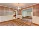 Elegant dining room with patterned wallpaper, chandelier, and traditional trim at 1970 Fisher Ne Trl, Atlanta, GA 30345