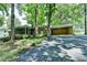 Charming brick home with attached carport and a delightful screened-in porch at 1970 Fisher Ne Trl, Atlanta, GA 30345