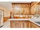 Bright eat-in kitchen with white countertops and abundant pine cabinets at 1970 Fisher Ne Trl, Atlanta, GA 30345