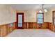 Bright kitchen featuring wood cabinets, tiled floors, and natural light from large windows at 1970 Fisher Ne Trl, Atlanta, GA 30345