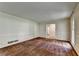 Neutral living room with paneled walls, carpet flooring, and bright window lighting at 1970 Fisher Ne Trl, Atlanta, GA 30345