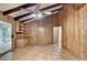 Living room with vaulted ceilings, beamed ceilings, and built-in shelving at 1970 Fisher Ne Trl, Atlanta, GA 30345