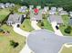 Aerial view of a well-kept home in a cul-de-sac neighborhood, showcasing landscaped yards at 4160 Grandview Vista St, Cumming, GA 30028