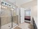 Bright bathroom features a glass shower and entrance to the bedroom at 4160 Grandview Vista St, Cumming, GA 30028