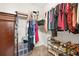 Walk-in closet boasts plentiful shelving and space for storage at 4160 Grandview Vista St, Cumming, GA 30028