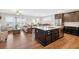 Beautiful eat-in kitchen featuring stainless steel appliances, a central island, granite countertops and an open floor plan at 4160 Grandview Vista St, Cumming, GA 30028
