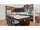 Modern kitchen with stainless steel appliances, granite countertops, and a large center island at 4160 Grandview Vista St, Cumming, GA 30028