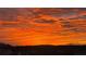 Striking image of an orange and blue sunrise over a residential neighborhood, presenting a scenic vista at 4160 Grandview Vista St, Cumming, GA 30028