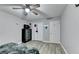 Comfortable bedroom with a ceiling fan, closet, and a neutral color scheme at 4444 Lisa Nw Way, Lilburn, GA 30047