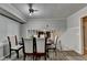 Bright dining room featuring wood floors, table and chairs, and white trim at 4444 Lisa Nw Way, Lilburn, GA 30047