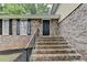Inviting brick front porch and entry of this charming two-story home at 4444 Lisa Nw Way, Lilburn, GA 30047