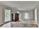 Light filled living room features hardwood floors and neutral paint at 4444 Lisa Nw Way, Lilburn, GA 30047