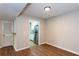 Functional dining area with an adjacent kitchen featuring white cabinetry and stainless steel appliances at 591 Emory Oaks Way # 591, Decatur, GA 30033