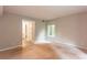 Spacious living room with neutral walls, carpet, and lots of natural light at 591 Emory Oaks Way # 591, Decatur, GA 30033