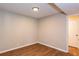 Neutral-toned room with wood flooring, offering a versatile space for various needs at 591 Emory Oaks Way # 591, Decatur, GA 30033